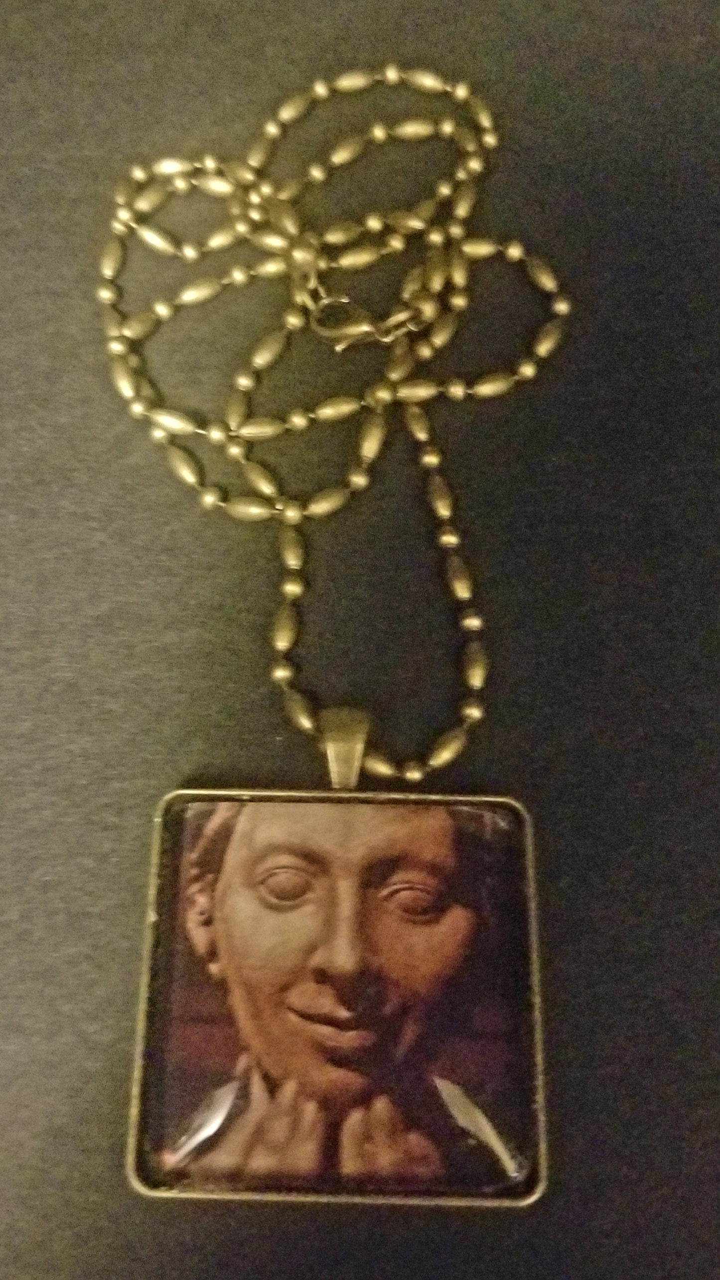 Mischievous Angel Cabochon Necklace