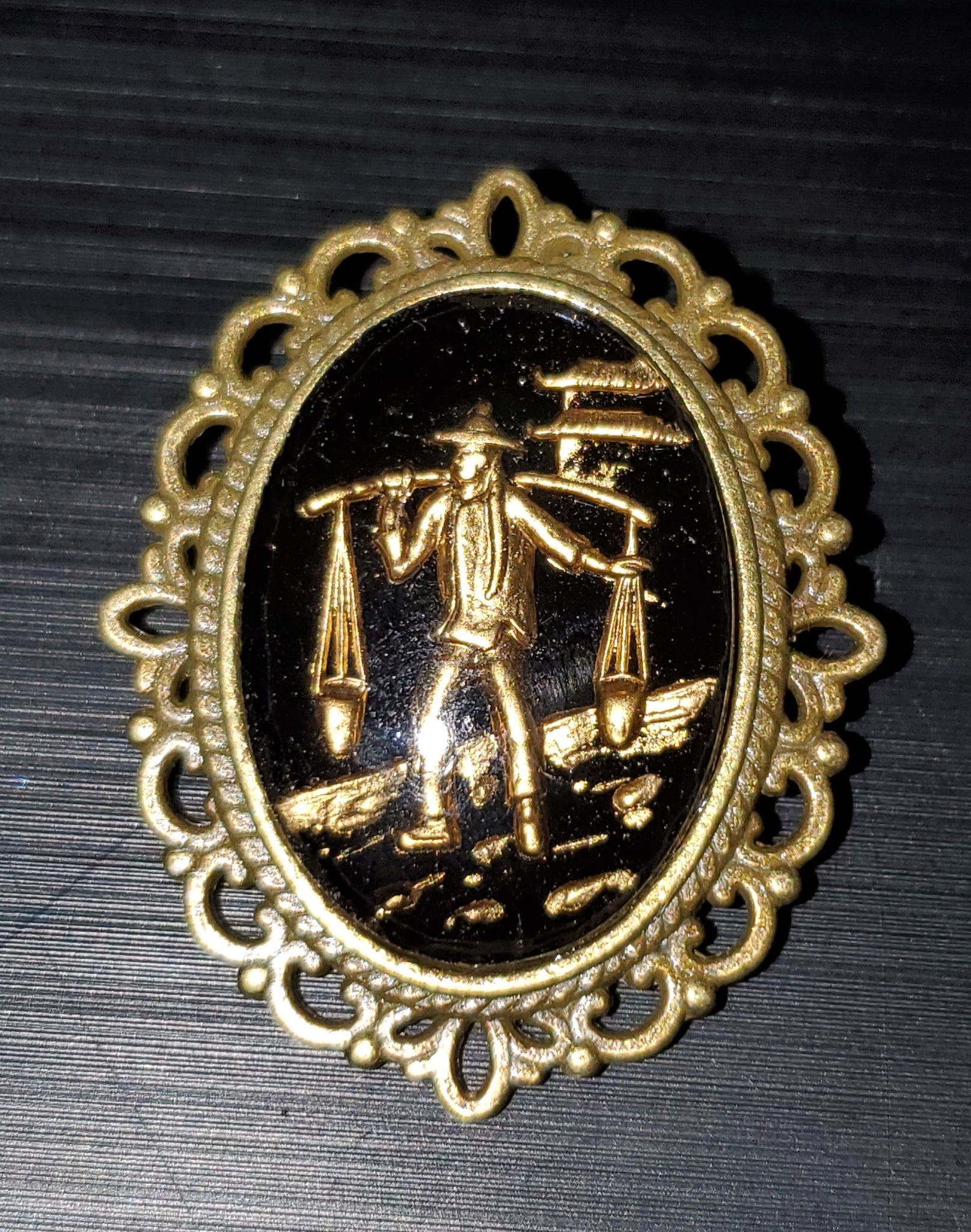 Asian Water Carrier Brooch