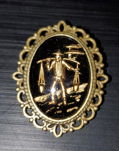 Asian Water Carrier Brooch
